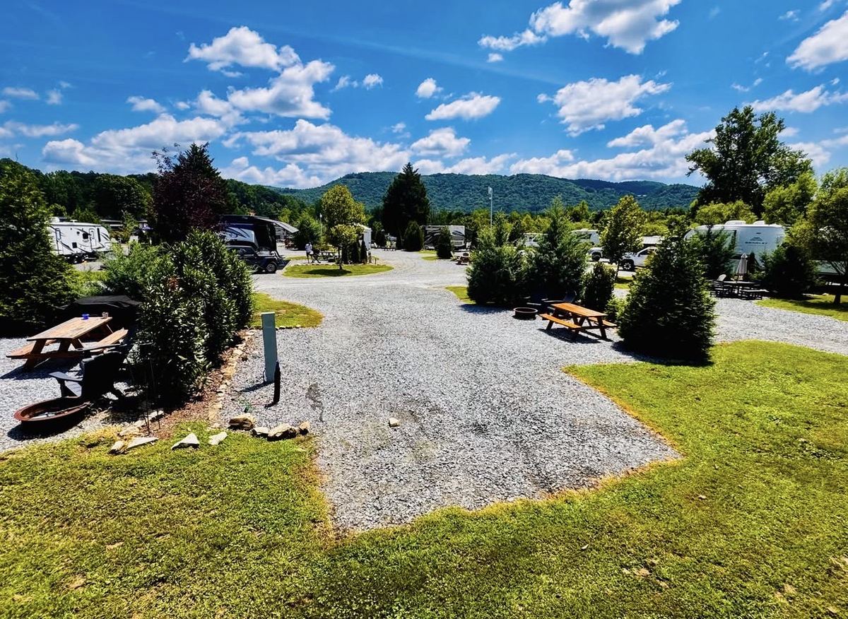 Well-kept RV sites with fire rings, picnic tables and mountain views